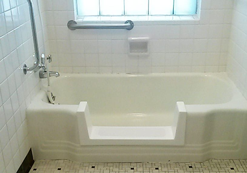 Converted cast iron bump-out tub