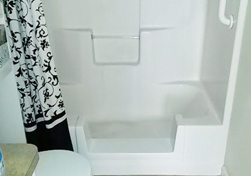 Converted fiberglass surround tub